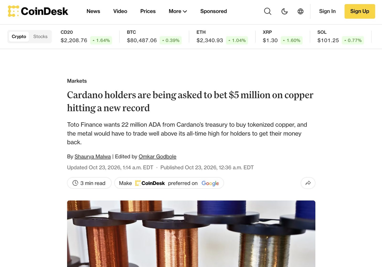 Screenshot of the CoinDesk Markets article headline: Cardano holders are being asked to bet 5 million dollars on copper hitting a new record, by Shaurya Malwa, October 23, 2026