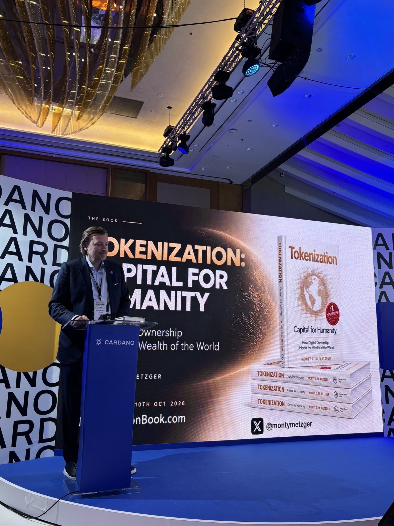 Monty Metzger presenting his book Tokenization: Capital for Humanity on the Cardano stage at TOKEN2049 Singapore
