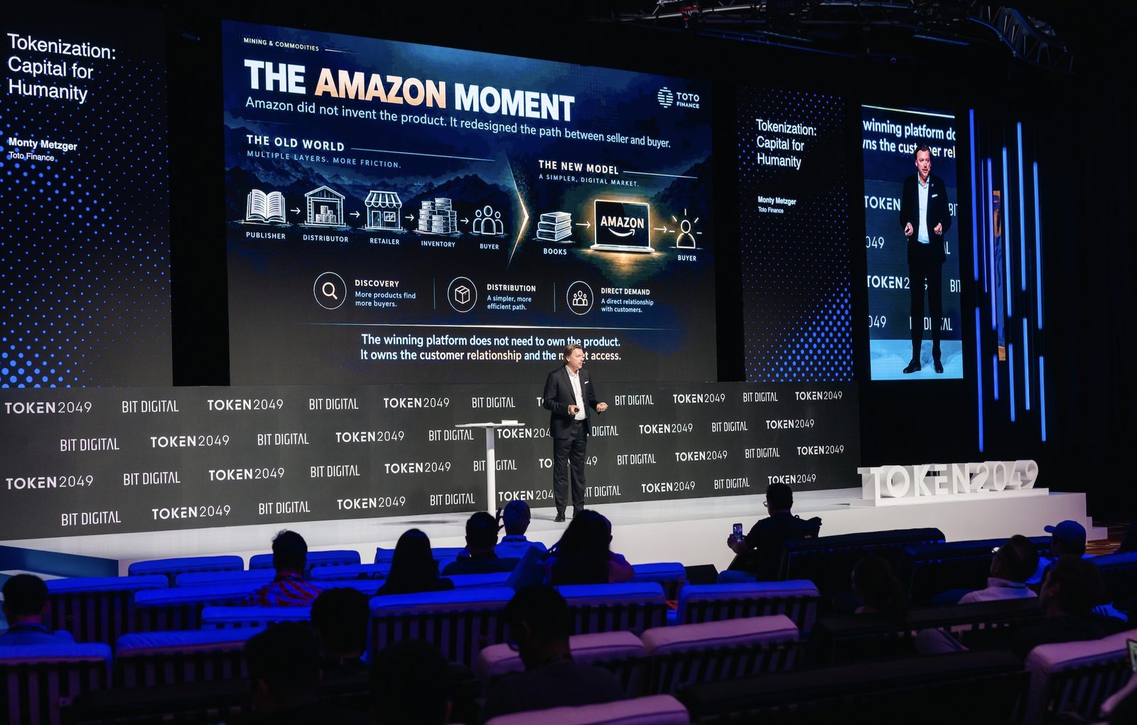Monty Metzger delivering the keynote Tokenization: Capital for Humanity on the Bit Digital main stage at TOKEN2049 Singapore 2026, with the slide The Amazon Moment