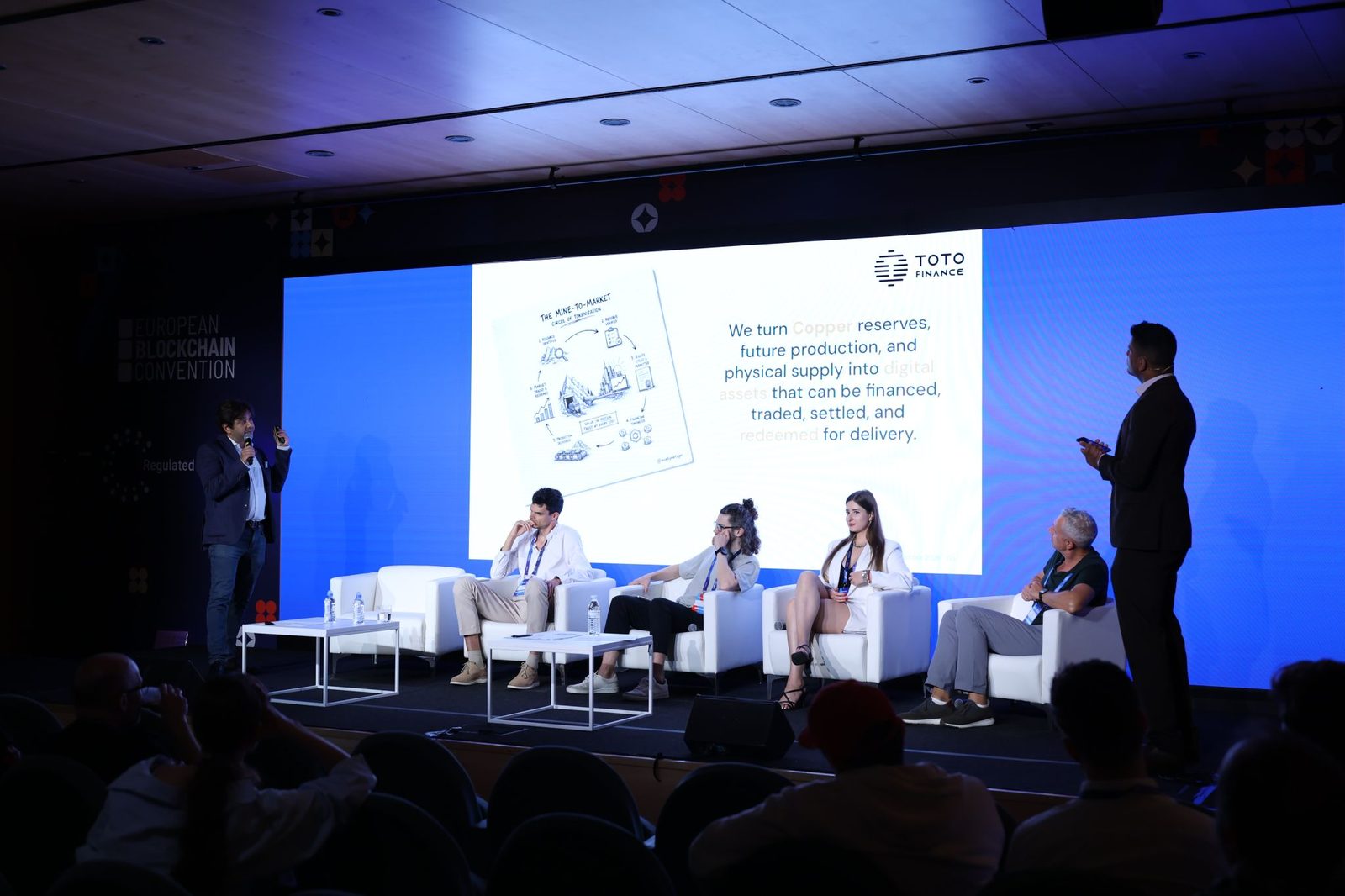 EBC12 Startup Battle stage at the European Blockchain Convention 2026 with the Toto Finance mine-to-market circle of tokenization slide